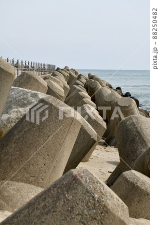 sea coast scenery rocky breakwater  88250482