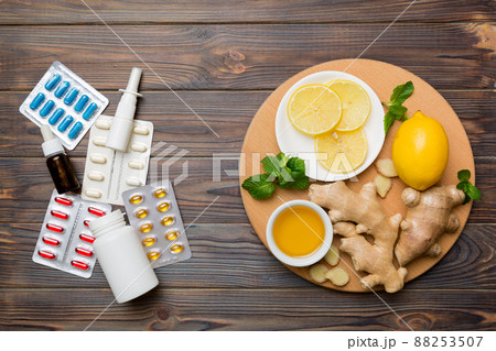 Natural cold and flu home remedies. Natural ingredients for immunity stimulation and viruses protection. top view flat lay Natural cold and flu home remedies. Natural ingredients for immunity stimulation and viruses protection. top view flat lay 88253507