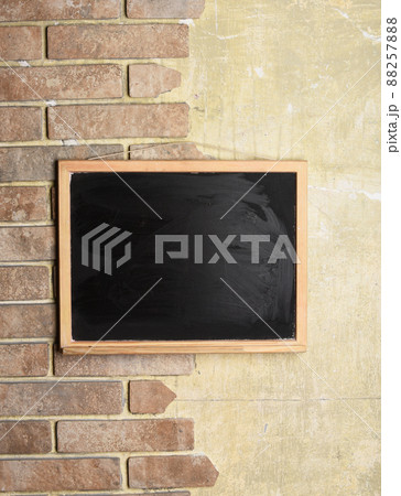 blackboard with place for text on brick and textured background blackboard with place for text on brick and textured background 88257888