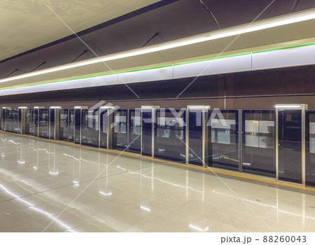 Platform sliding doors are a system used at subway stations that isolates passengers from railway tracks for the safety of passengers. The doors open after the train arrives at the station Platform sliding doors are a system used at subway stations that isolates passengers from railway tracks for the safety of passengers. The doors open after the train arrives at the station 88260043