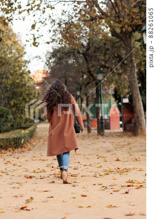 confident mid fashion woman with fall colours in Talavera de la Reina, Toledo, Castilla la mancha 88261065