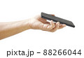 Holding the phone  to scan. 88266044