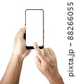 hand holding black smartphone isolated 88266055