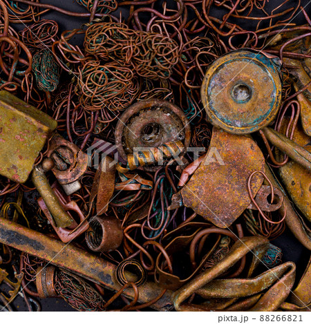 A pile of copper scrap for recycling. Copper is mainly heat pipes and heat exchangers from laptop cooling systems. A pile of copper scrap for recycling. Copper is mainly heat pipes and heat exchangers from laptop cooling systems. 88266821