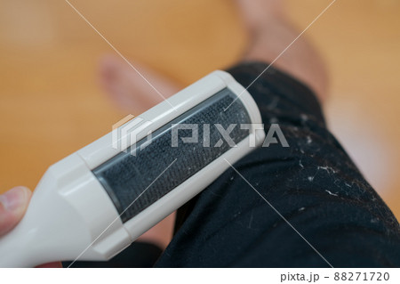 黒い服についたほこりが目立つの写真素材 [88271720] - PIXTA
