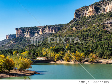 Rocky landscape with mountains lake La Toba reservoir. Serrania de Cuenca, Cuenca, Spain 88277369