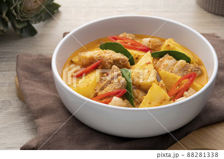 Thai Red curry Pineapple with Sliced Pork Belly in white bowl 88281338