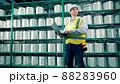 Male worker is doing inventory of fiberglass in the storage 88283960