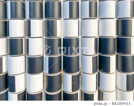 Texture of black and white cylinders and squares for counting on the playground for children. The background 88289433