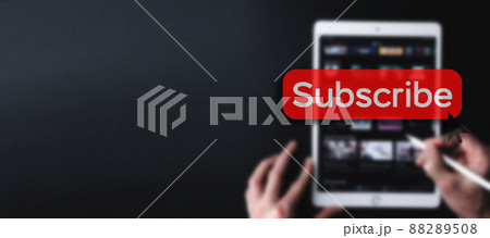 Subscribe button. Online video subscription red button. Internet service on laptop digital tablet blured banner background. Visual contents concept. Social networking service. Subscribe button. Online video subscription red button. Internet service on laptop digital tablet blured banner background. Visual contents concept. Social networking service. 88289508