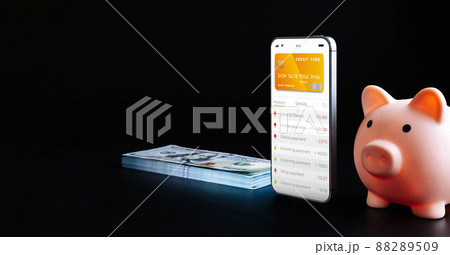 Mobile banking application. Mobile phone with internet online bank app. Hundred dollar bill on black background. Save money business wallet. Mobile banking application. Mobile phone with internet online bank app. Hundred dollar bill on black background. Save money business wallet. 88289509