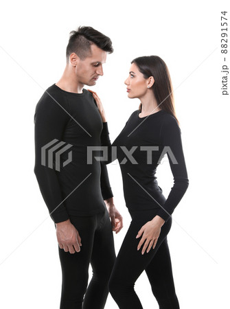 Couple wearing thermal underwear isolated on white 88291574