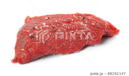 Fresh raw beef cut with spices isolated on white 88292147