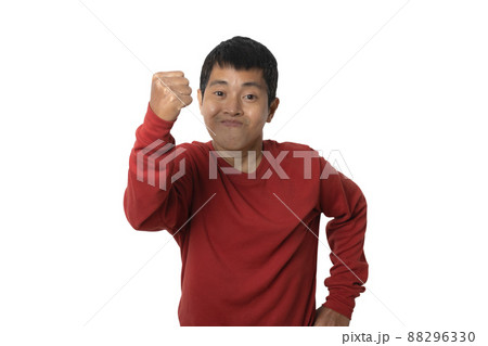 Portrait of young man with winner gesture and celebrating victory happy. Portrait of young man with winner gesture and celebrating victory happy. 88296330