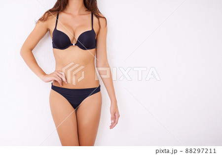 Shes got a body to be proud of. Cropped shot of a young woman posing in her underwear. 88297211