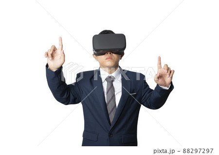 Businessman wearing VR Headset touching something isolated on white background. 88297297