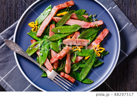 fried sugar snap peas with tuna slices fried sugar snap peas with tuna slices 88297517