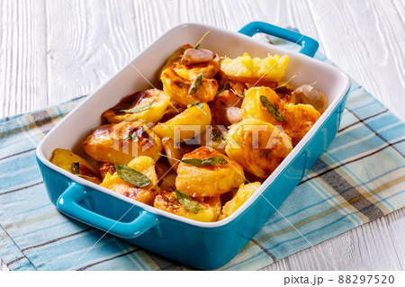 roasted squashed potatoes with garlic and sage roasted squashed potatoes with garlic and sage 88297520