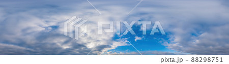 Winter sky panorama with Cumulonimbus clouds in Seamless spherical equirectangular format. Full zenith for use in 3D graphics, game and composites for aerial drone 360 degree panoramas as sky dome. Winter sky panorama with Cumulonimbus clouds in Seamless spherical equirectangular format. Full zenith for use in 3D graphics, game and composites for aerial drone 360 degree panoramas as sky dome. 88298751