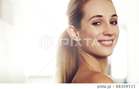 I love being in the gym. Cropped portrait of an attractive young woman working out in the gym. 88309515
