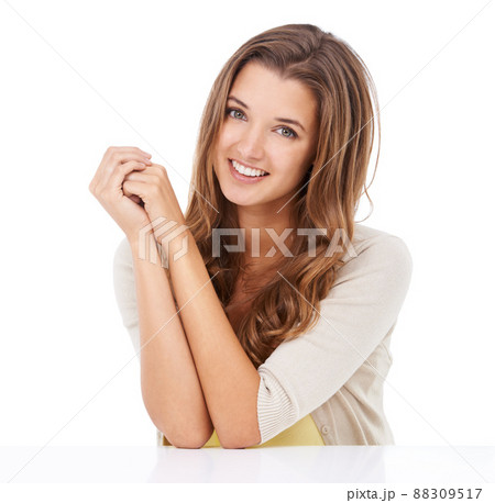 Shes got such a carefree attitude. Portrait of a beautiful young woman looking relaxed in the studio. Shes got such a carefree attitude. Portrait of a beautiful young woman looking relaxed in the studio. 88309517