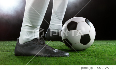 Soccer player in action, ready to kick the ball 88312511