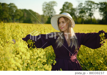 woman in a blooming field woman in a blooming field 88330237
