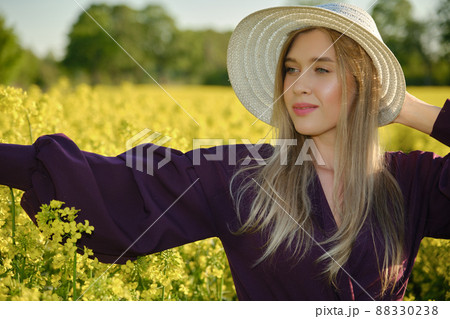 woman in a blooming field 88330238