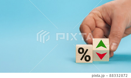Cube block with percentage symbol icon. Interest rate financial and mortgage rates concept. Wood 88332872