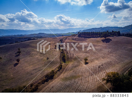 Agriculture in Italy - flight over beautiful fields Agriculture in Italy - flight over beautiful fields 88333843