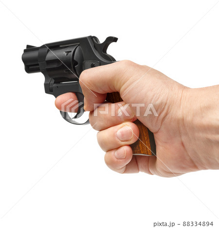 Hand holding pistol 88334894