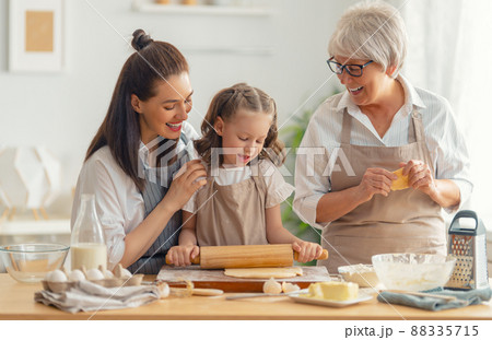 family are preparing bakery together family are preparing bakery together 88335715
