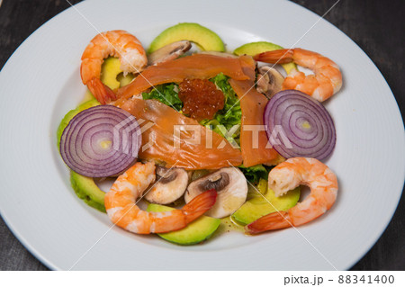 Healthy breakfast with salmon, salad, avocado mushroom, salmon egg, red onion 88341400
