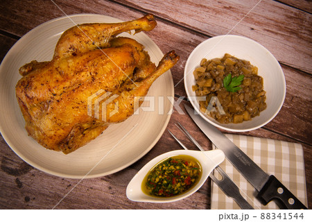 Recipe roast chicken, garlic chimichurri, stewed eggplant 88341544