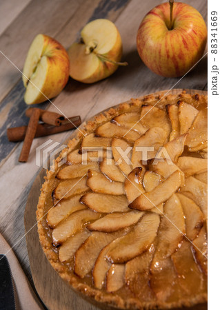 Delicious apple pie on a wooden table, from above 88341669
