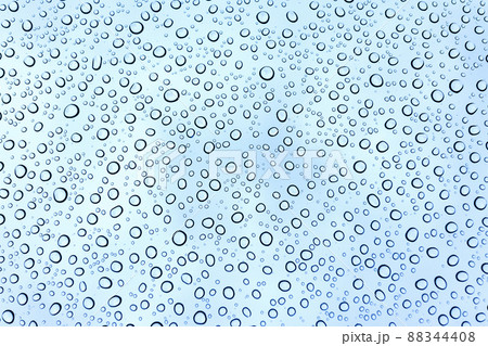 Rain drops on the car windshield after raining in rain season 88344408
