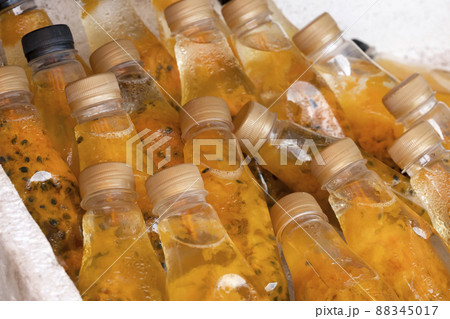Passion fruit bottles fresh juice close-up. lifestyle photos from the streets of Thailand. 88345017