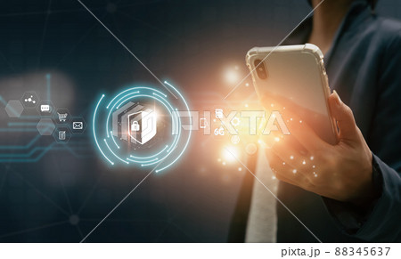Business man protecting data personal information on smartphone. Shield lock icon and internet technology networking connection on digital. Data protection privacy concept. Business man protecting data personal information on smartphone. Shield lock icon and internet technology networking connection on digital. Data protection privacy concept. 88345637