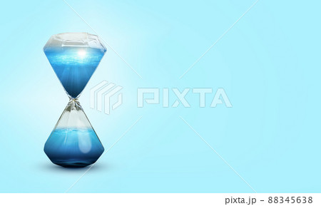 Hourglass with water on blue background. 88345638
