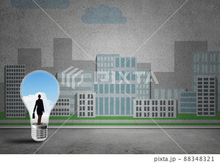 Businesswoman trapped in bulb Businesswoman trapped in bulb 88348321