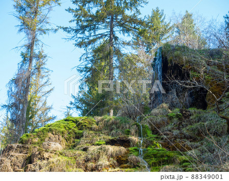 The waterfall of Tuefels Chilen in the hills around Zurich, Switzerland, is famous for its sedimentary tuff structure. 88349001