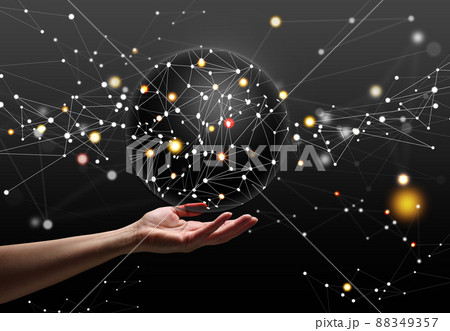 a female hand holds a sphere with global international connections. Futuristic visualization of global business and world internet network a female hand holds a sphere with global international connections. Futuristic visualization of global business and world internet network 88349357