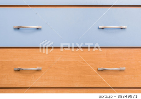 Metal vintage handle brown and blue antique dresser object design of furniture and interior of the house room, close-up 88349971