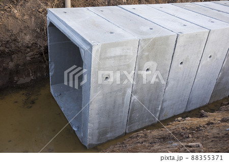 Large size square concrete manholes are  installed at construction site 88355371