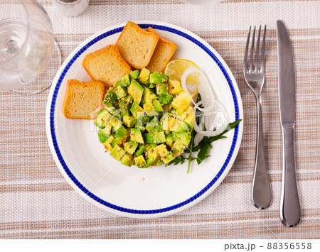 Salmon tartar with avocado 88356558