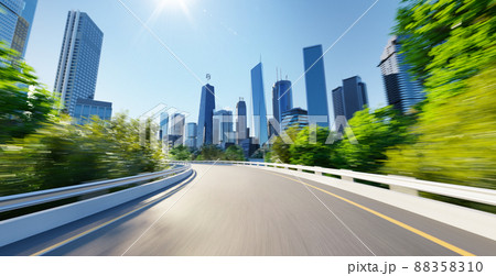 Highway overpass motion blur with cityscape skyline 88358310
