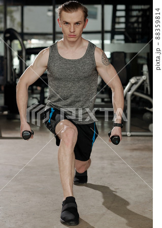 Man Doing Forward Lunges Man Doing Forward Lunges 88359814