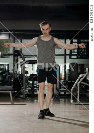 Man Exercising With Resistance Band Man Exercising With Resistance Band 88359815