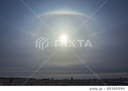 Very rare atmospheric phenomenon called sun halo, Various sun halos arc appearing in the sky in the city Very rare atmospheric phenomenon called sun halo, Various sun halos arc appearing in the sky in the city 88366994
