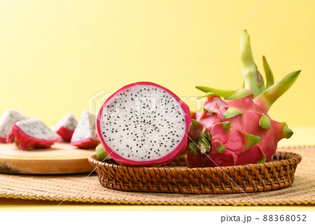 Fresh dragon fruit or pitaya in basket on yellow background, Tropical fruit Fresh dragon fruit or pitaya in basket on yellow background, Tropical fruit 88368052